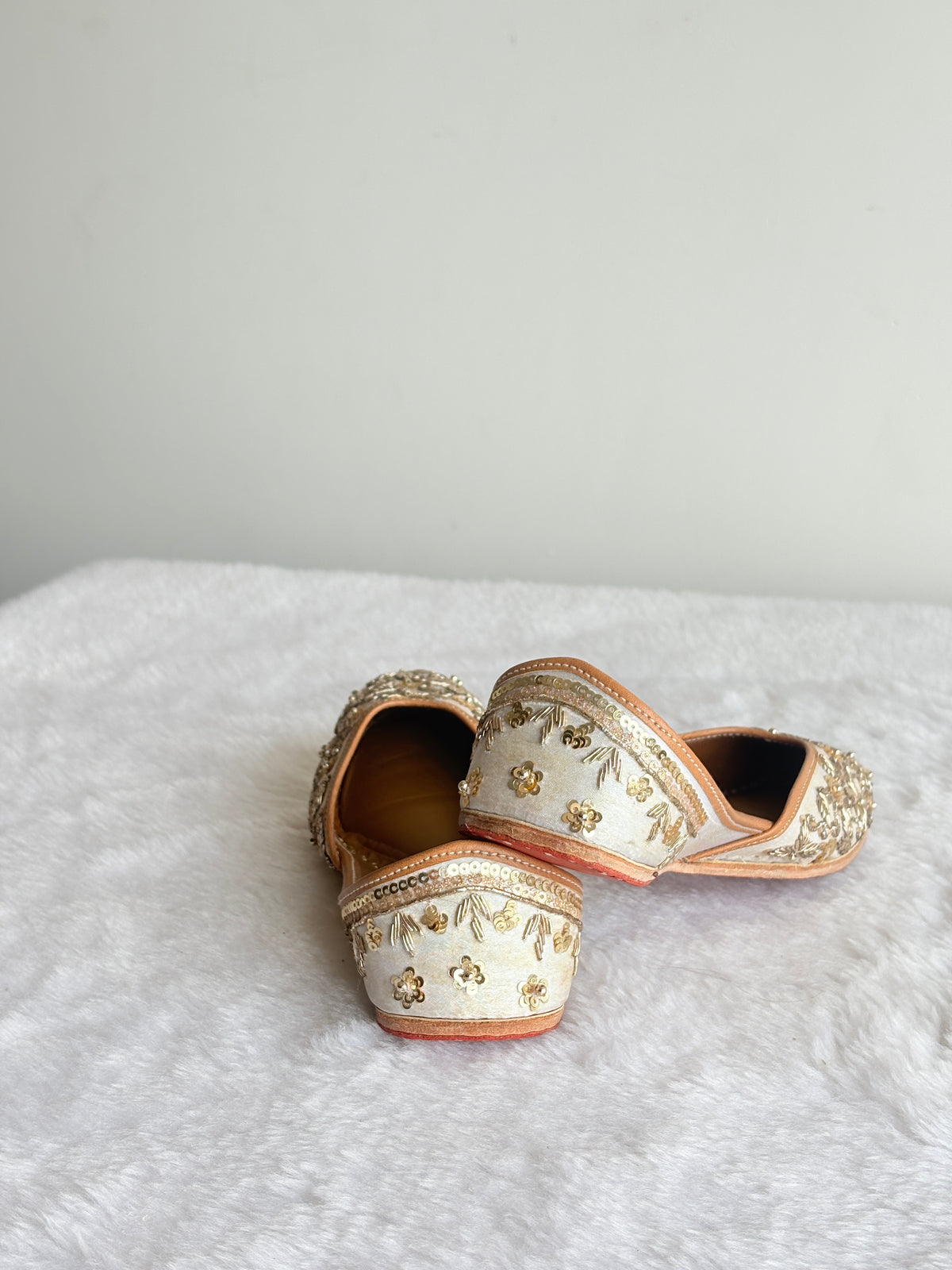 Zehra Ivory Juttis showing embellished heel detailing
