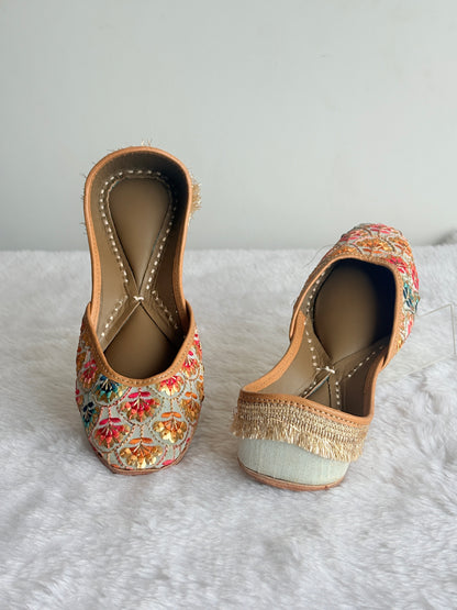 Rang Mahal Juttis with multicoloured floral embroidery and gold-toned detailing
