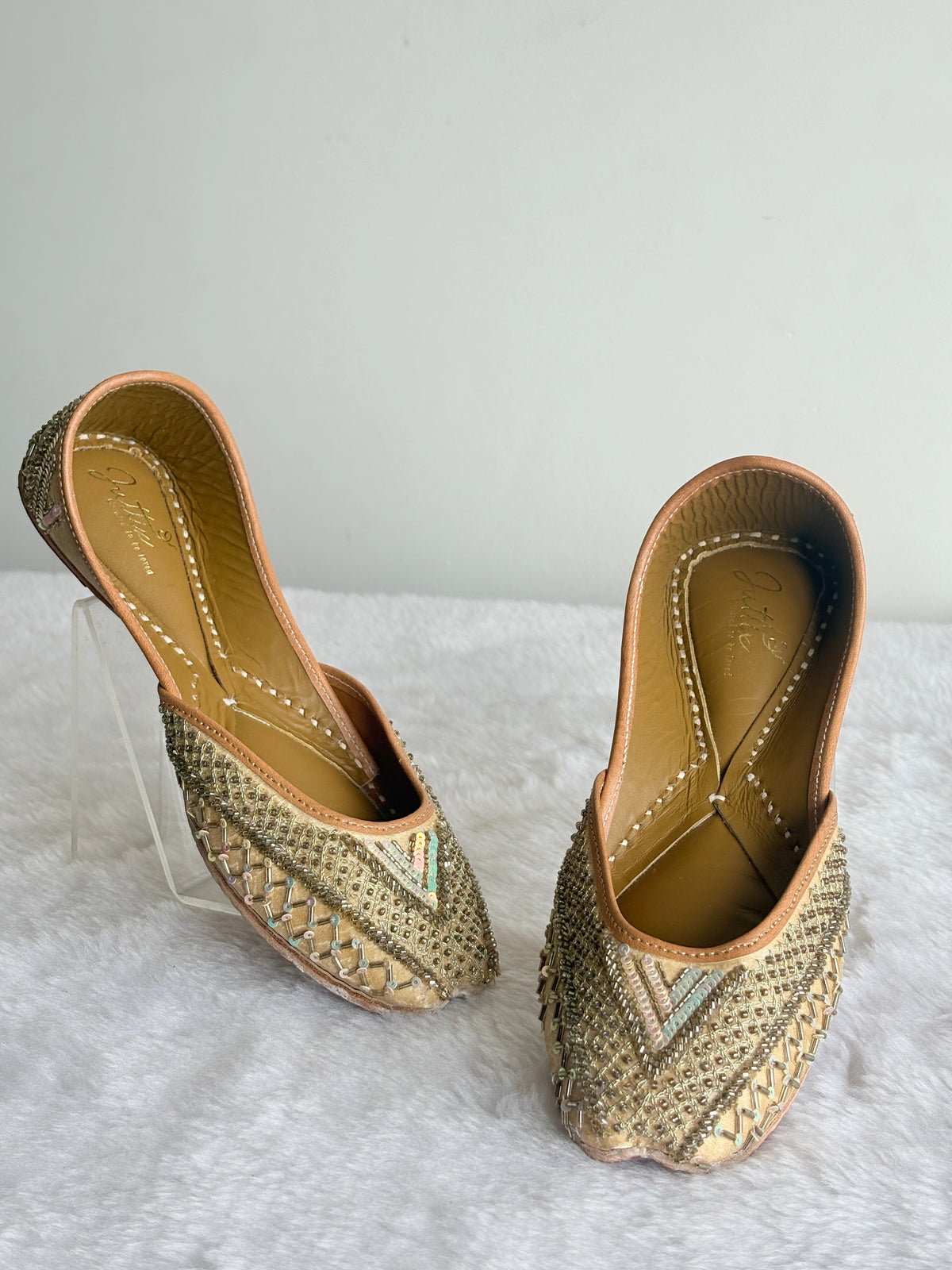 Zehra Gold Juttis front and side view
