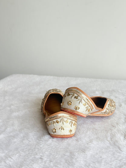Zehra Ivory Juttis showing embellished heel detailing