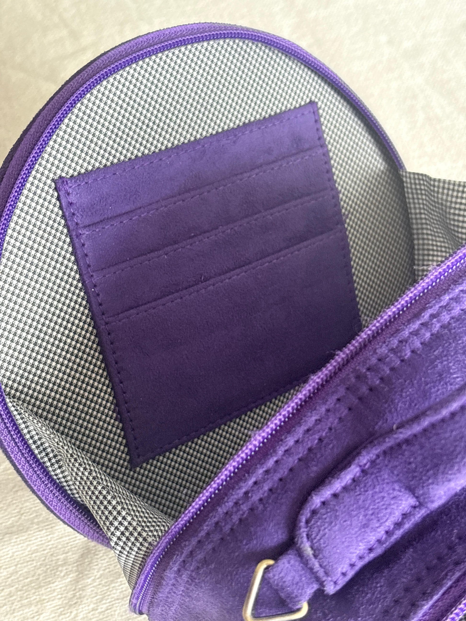 Purple drum bag interior showing card holder slots