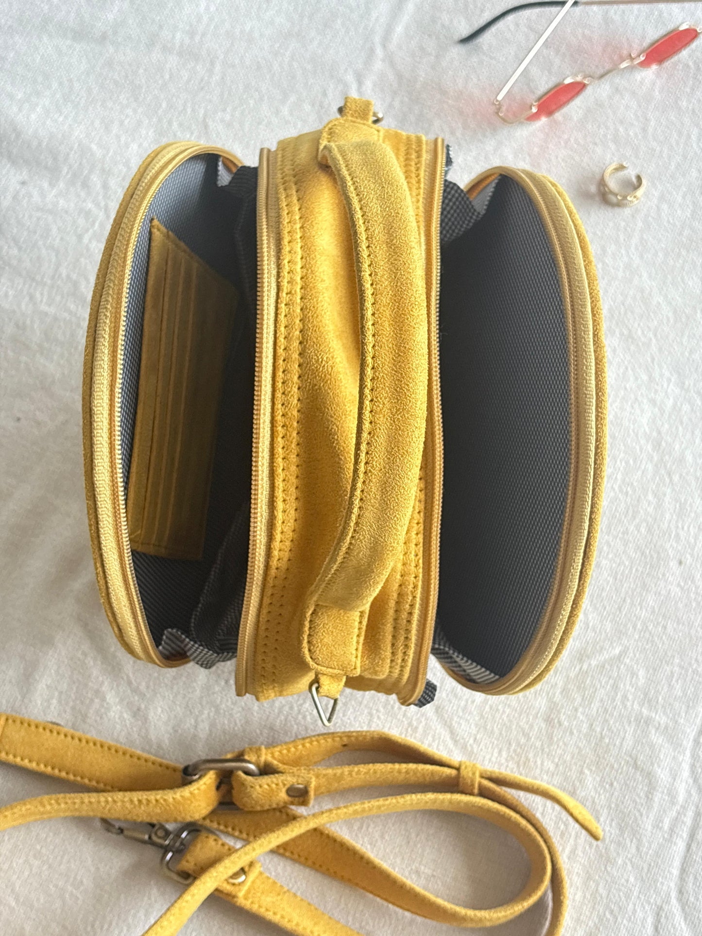 Luna Stud Sling front view with monstera leaf appliqué