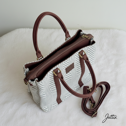 Top view of geometric handbag showing zipper closure