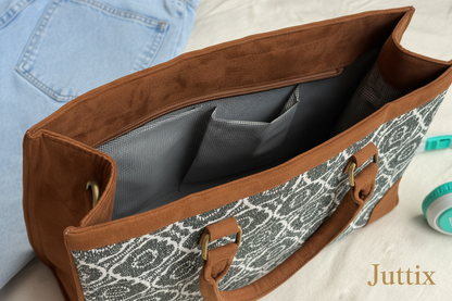 Juttix branded handbag compartment view